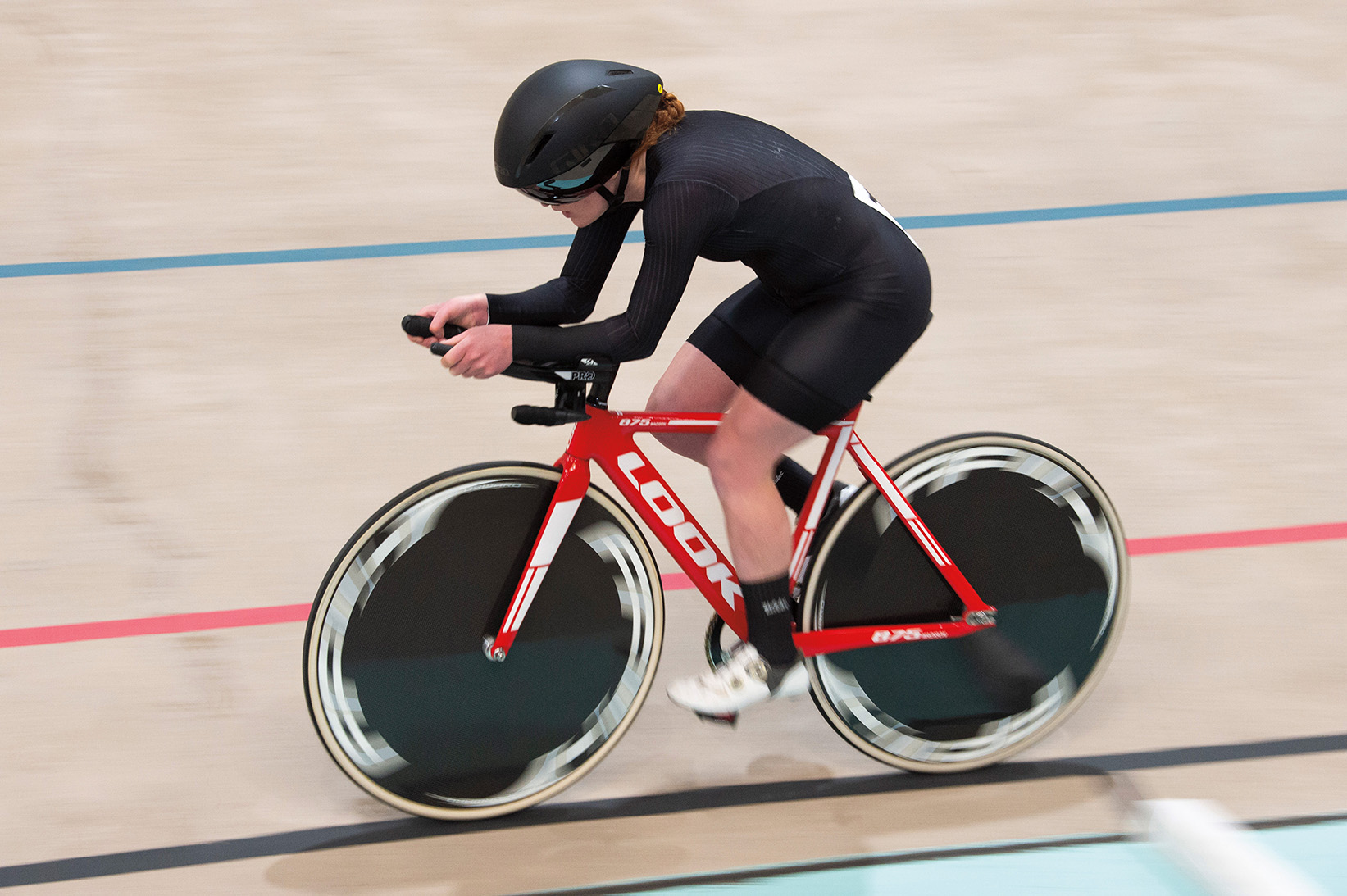 Clara Brown '17 riding a bike