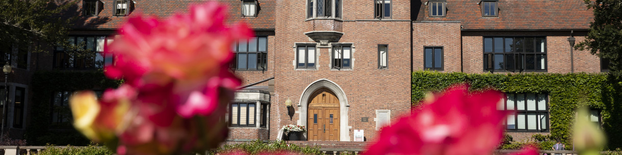 Brick building with flowers in front