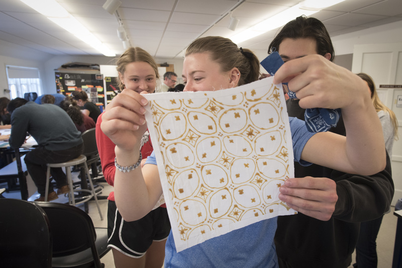 Students trying their hand at batik