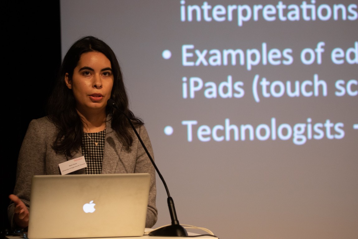 A student presenting a paper at a conference in Vienna, Austria