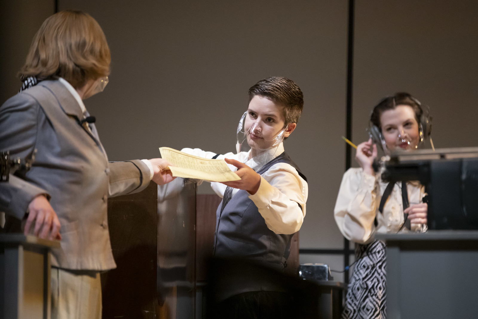 Student actors perform onstage in Norton Clapp Theatre in a production of Machinal, 2021