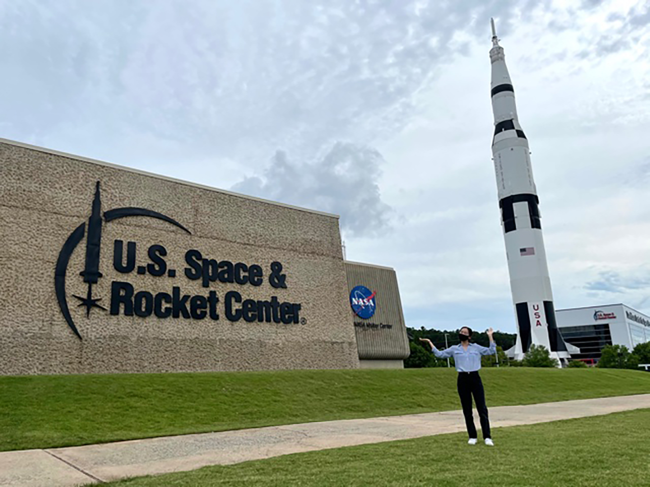 Kyra Lee ’24 in front of NASA's Marshall Space Flight Center