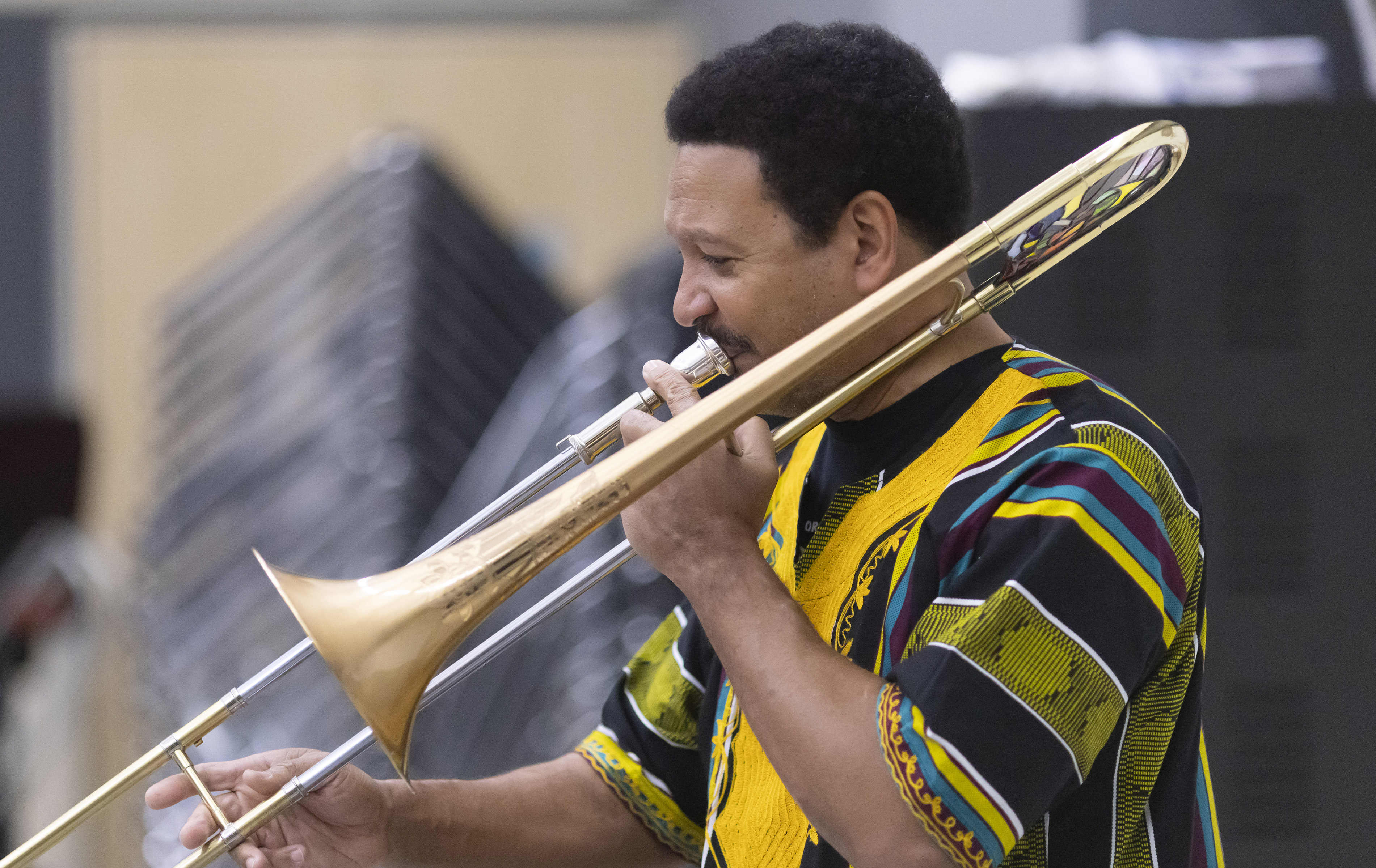 Jazz legend Delfeayo Marsalis plays trombone during rehearsal with the Puget Sound Jazz Orchestra
