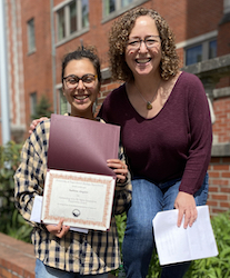 Sabine Angier receiving award from Stacey Weiss