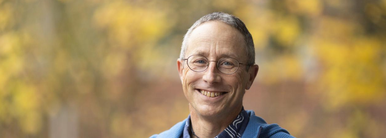 Portrait of Dr. Peter Hodum standing outside