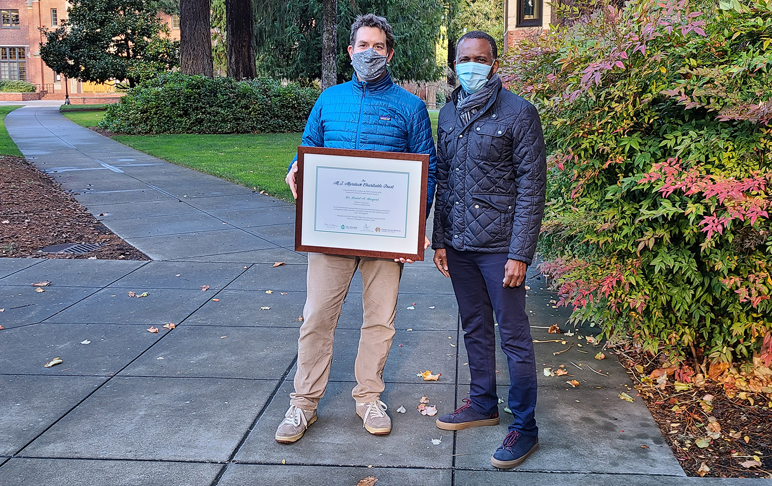 Prof. Dan Burgard with President Isiaah Crawford