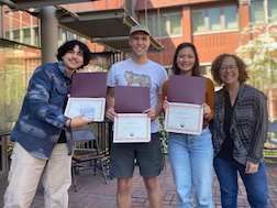 Johnsy, Henry and Kelci receiving Phi Sigma Symposium award from Stacey Weiss