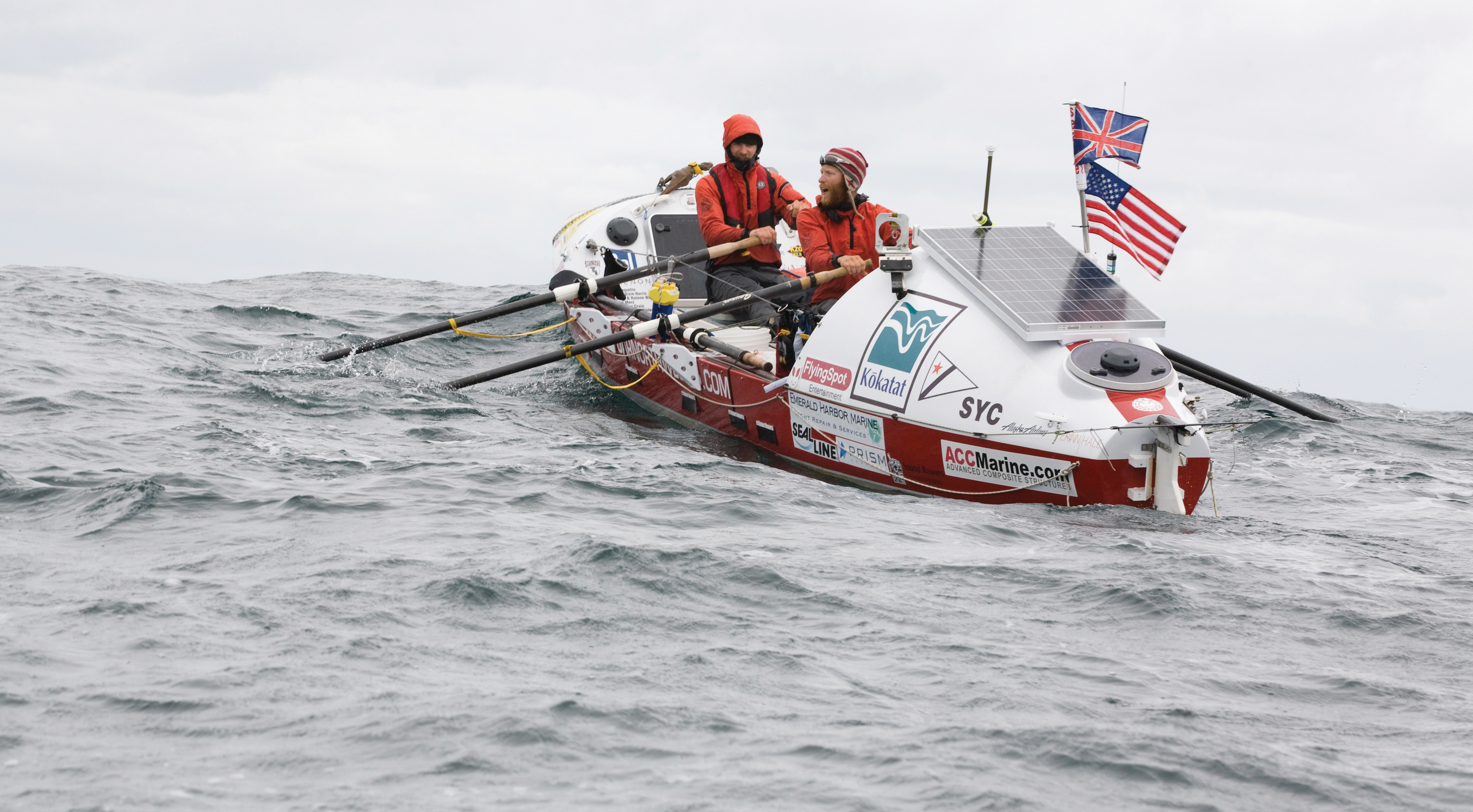 The crew of the James Robert Hanssen pull oars as the boat crests a wave on the Atlantic Ocean between New York to England in 2006.