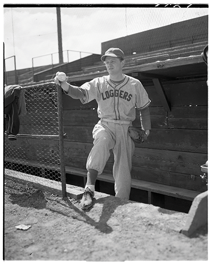 This 1951 photo of an unidentified baseball player—or coach?—may be the oldest existing photo of anyone in a Logger uniform.