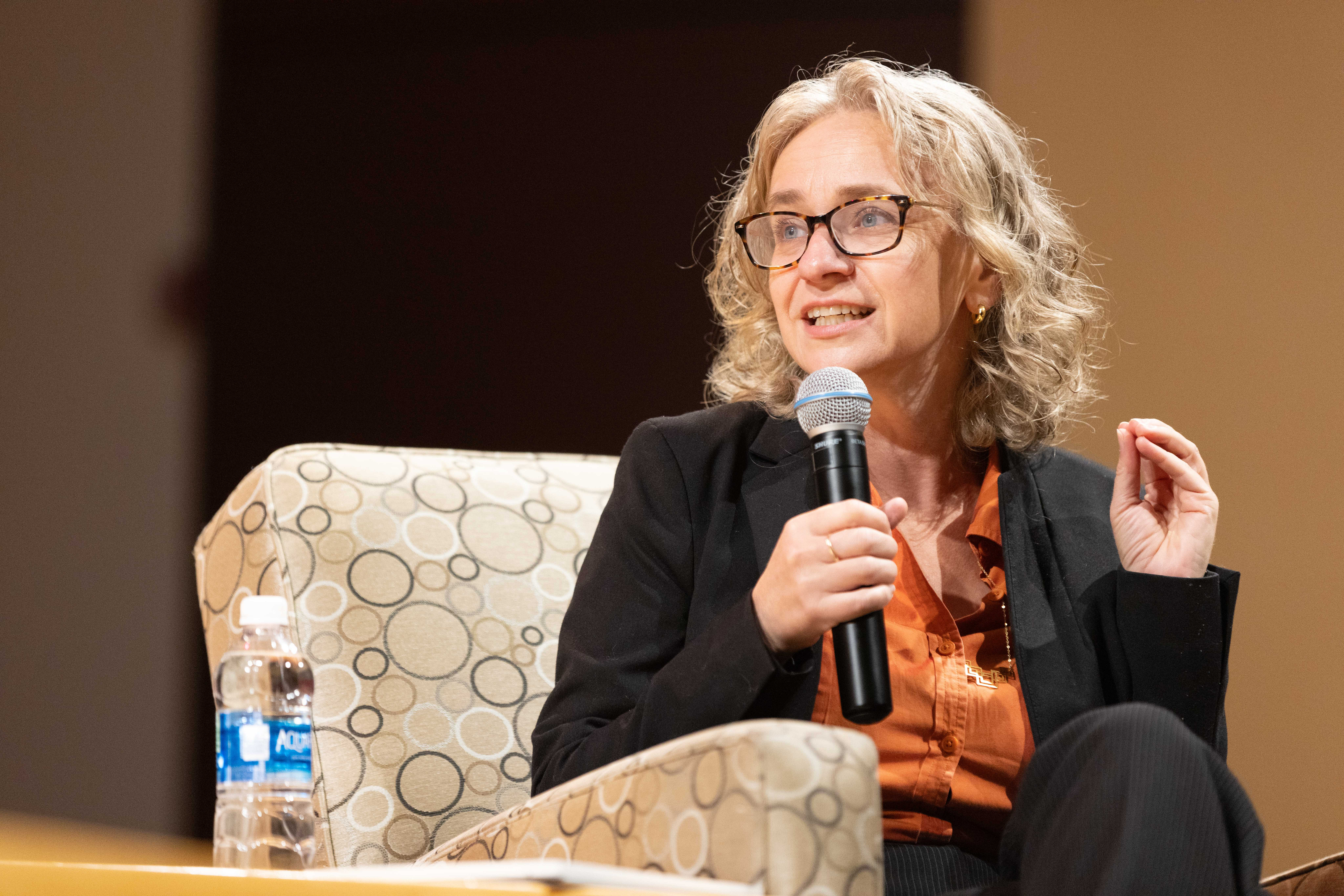 Prof. Robin Jacobson moderates a discussion on campus with members of the Washington State Supreme Court in 2023.