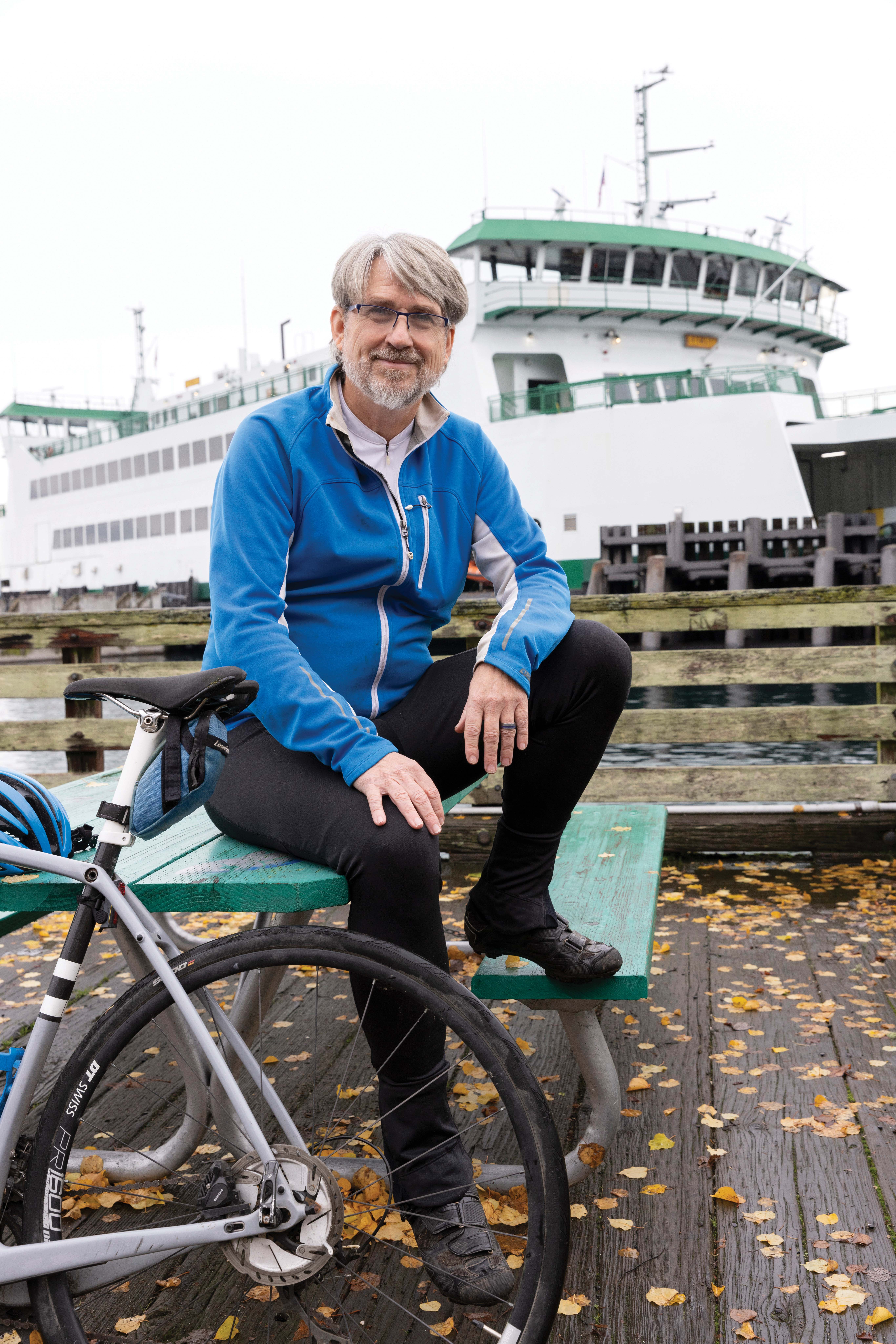 Prof. Doug Sackman with his bike in front of the Vashon-Talequah Ferry.