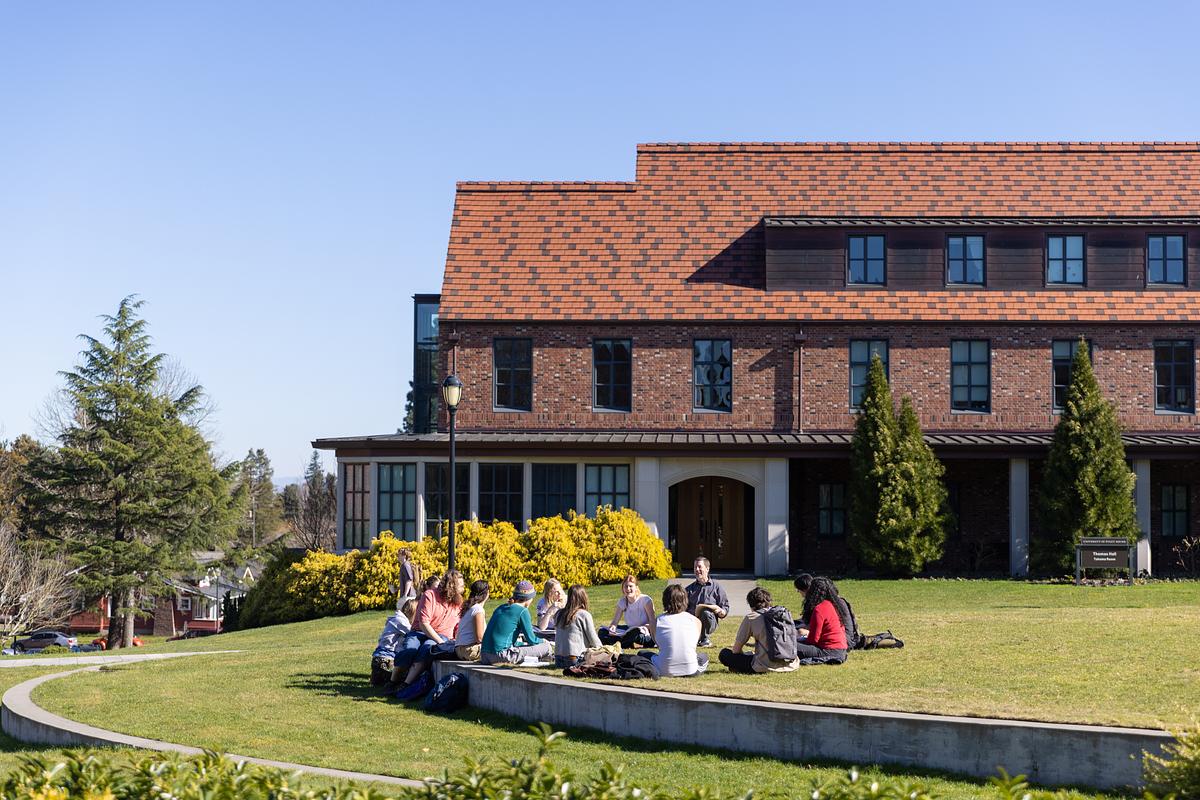 Students on campus on a sunny spring day.