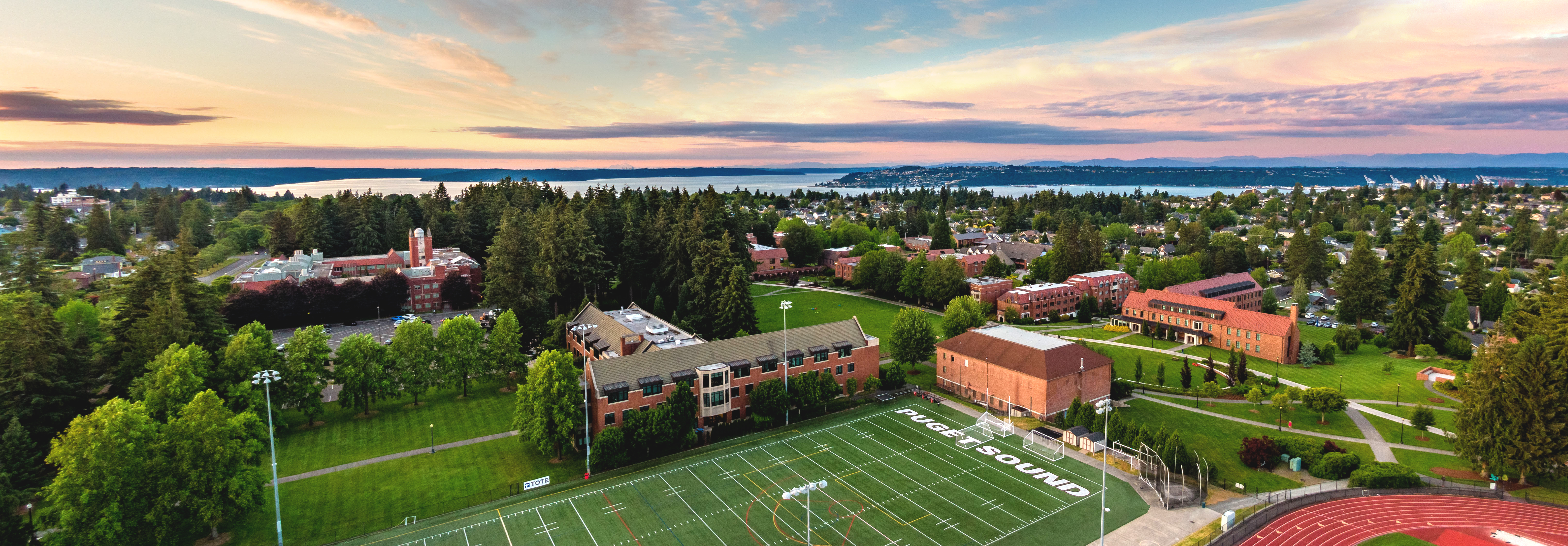 Aerial view of campus with Commencement Bay in the background