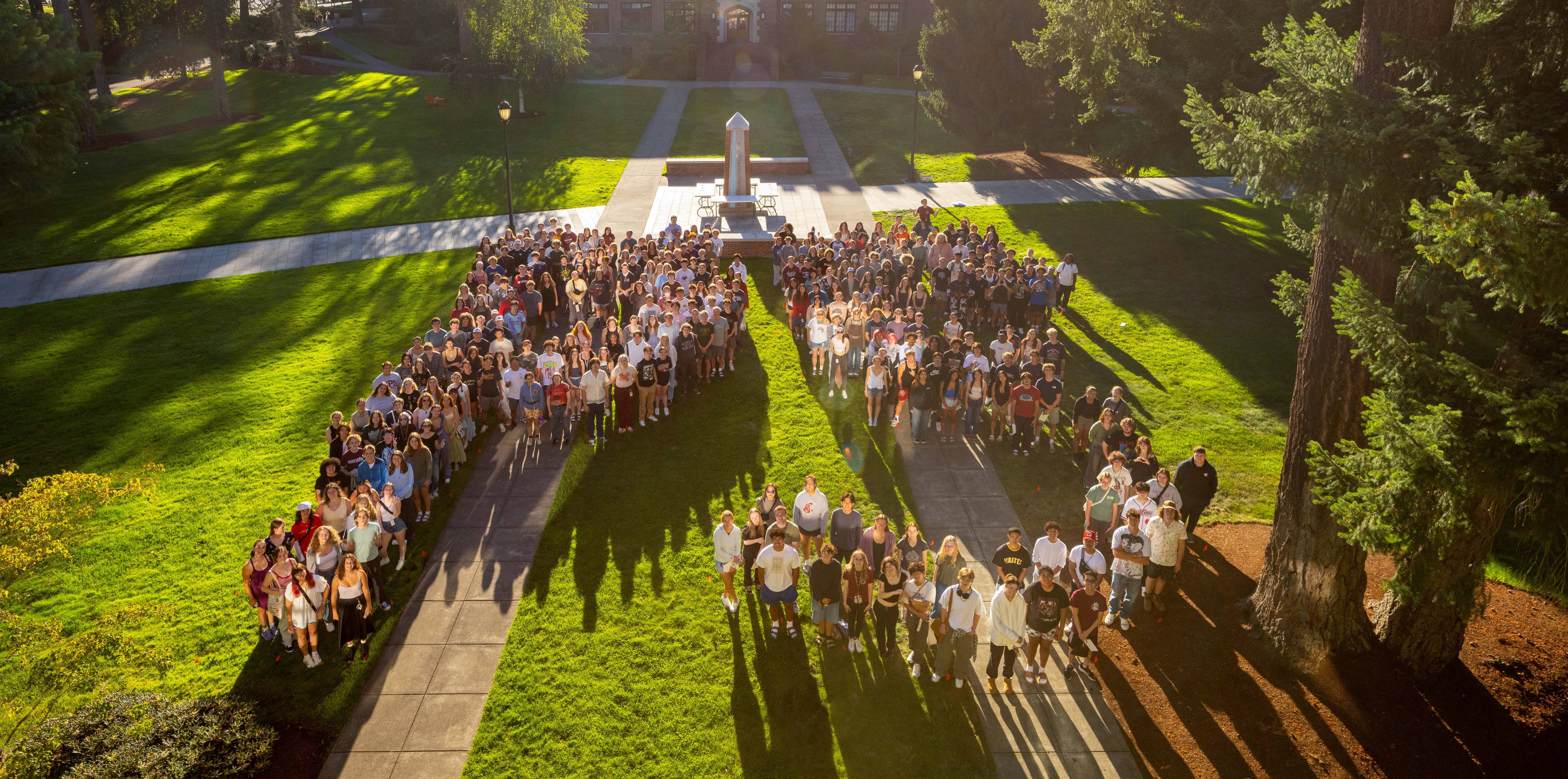 New students forming a P and S on Karlen Quad