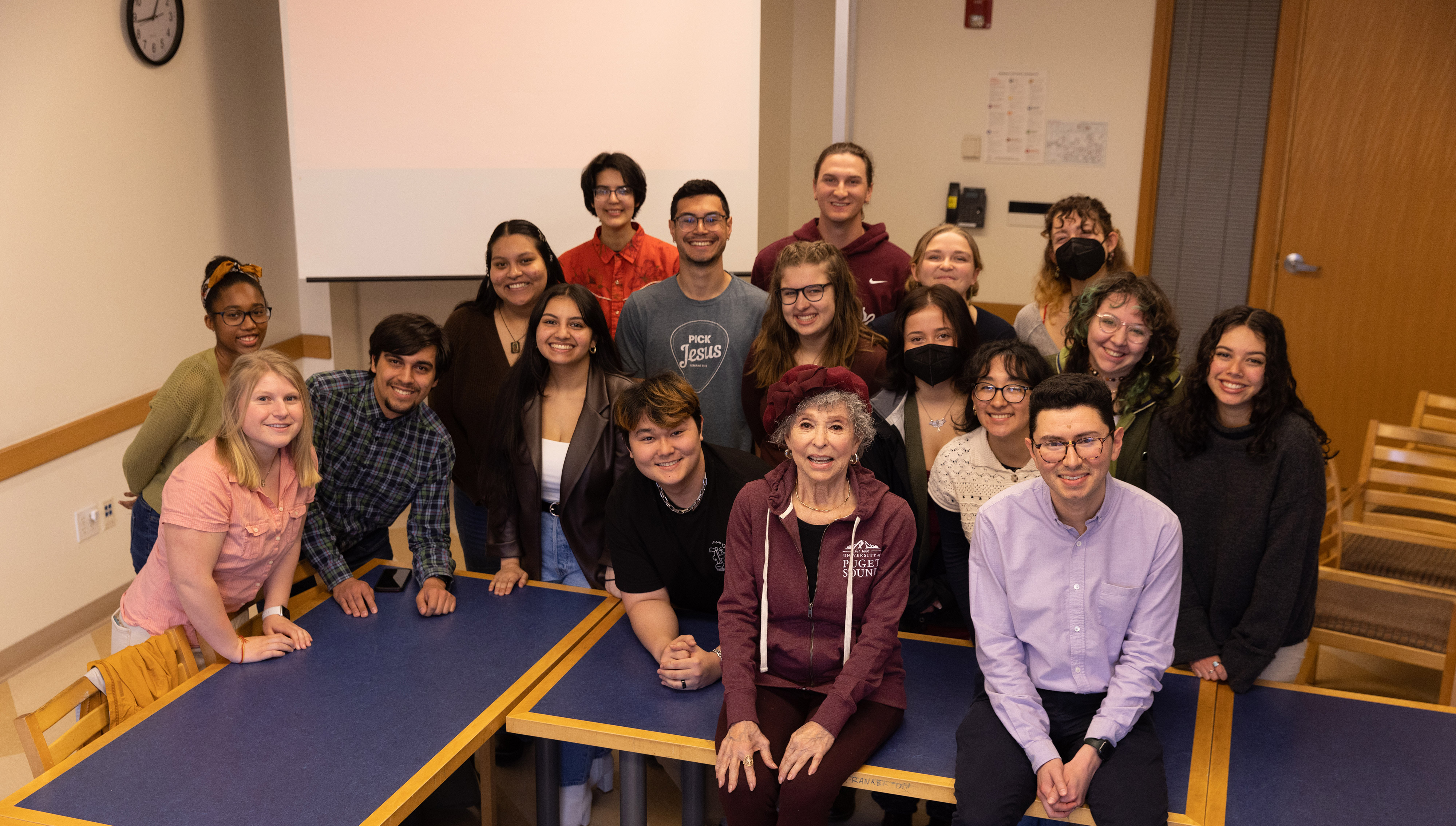 Rita Moreno interacts with students of Professor Andrew Gomez in a classroom visit