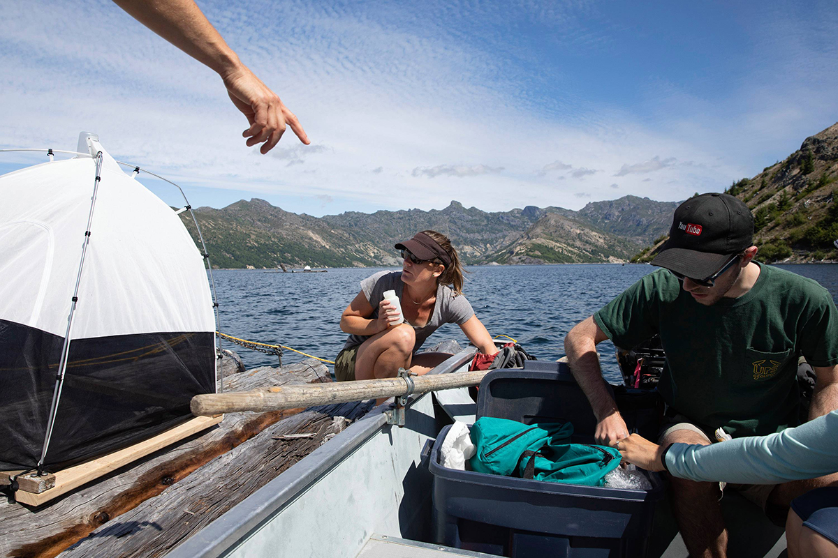 Prof. Kena Fox-Dobbs doing field research at Spirit Lake with students