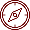 Maroon icon of a compass.