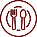 Maroon dinner plate with a fork and spoon.