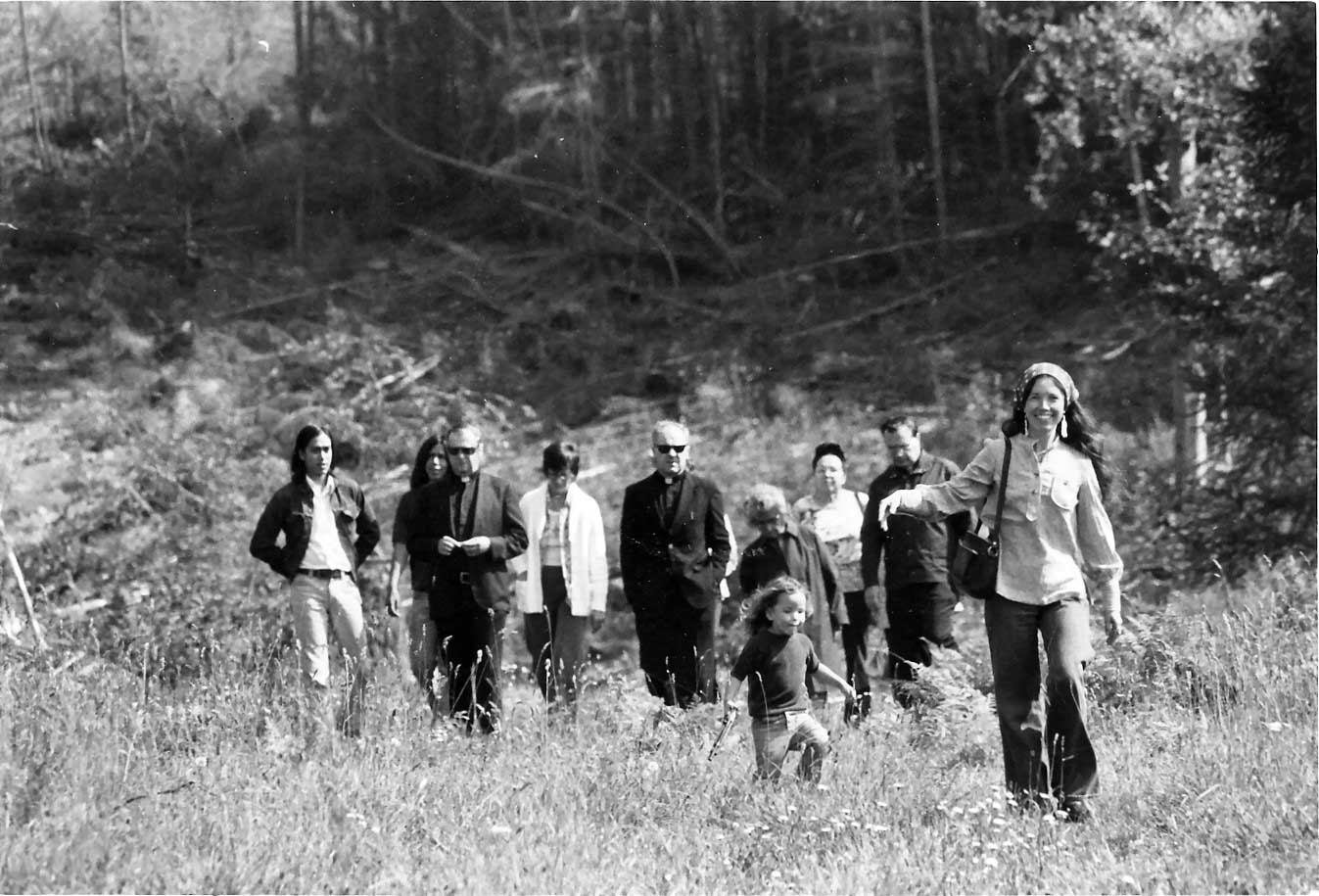 Bennett Bill and her daughter, La-huh-bate-soot, lead the newly assigned Archbishop Raymond Hunthausen and others on a walking tour in 1975. Courtesy of the Puyallup Tribe.