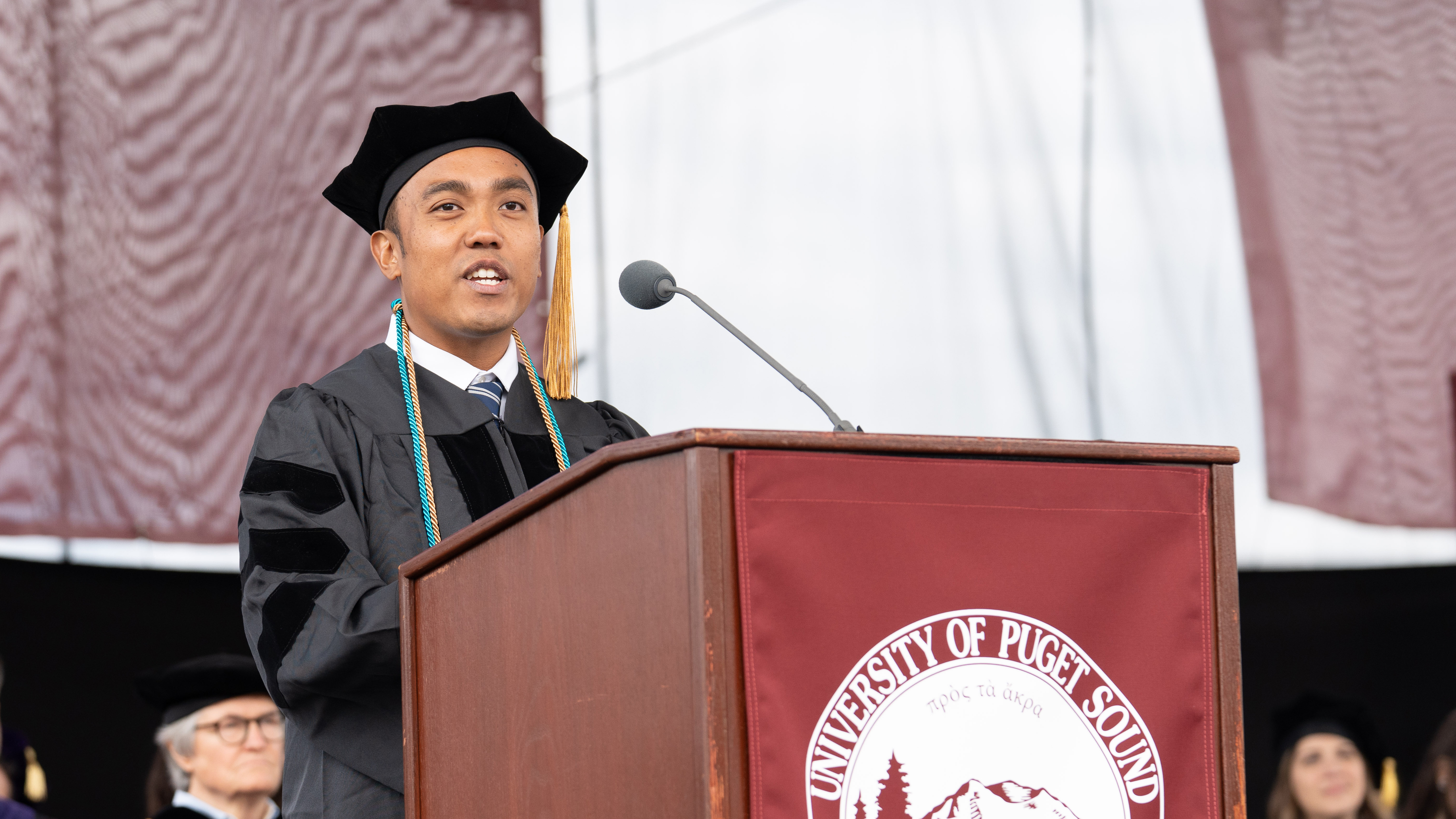 Rovin Ian Antonio ’23, DPT’26 delivers the graduate student address at the Commencement Ceremony on May 10, 2026.