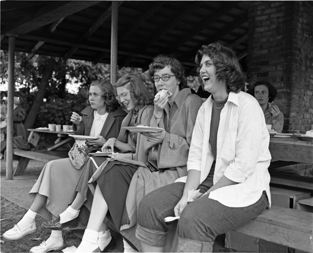 Loggers Mary Louise Moon Long ’50 (far left) and Beverly Sinkovich Marcelia ’51 at a summer picnic at Titlow Beach in 1949.