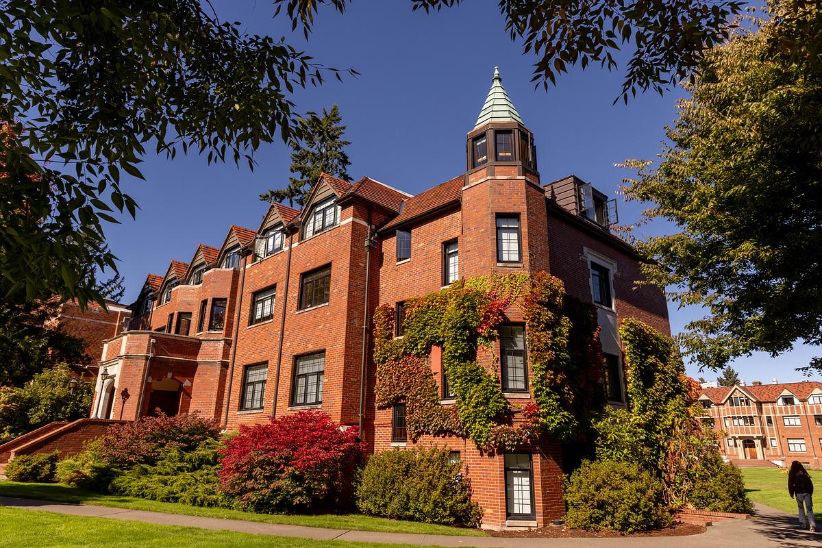 Red brick building with red vines