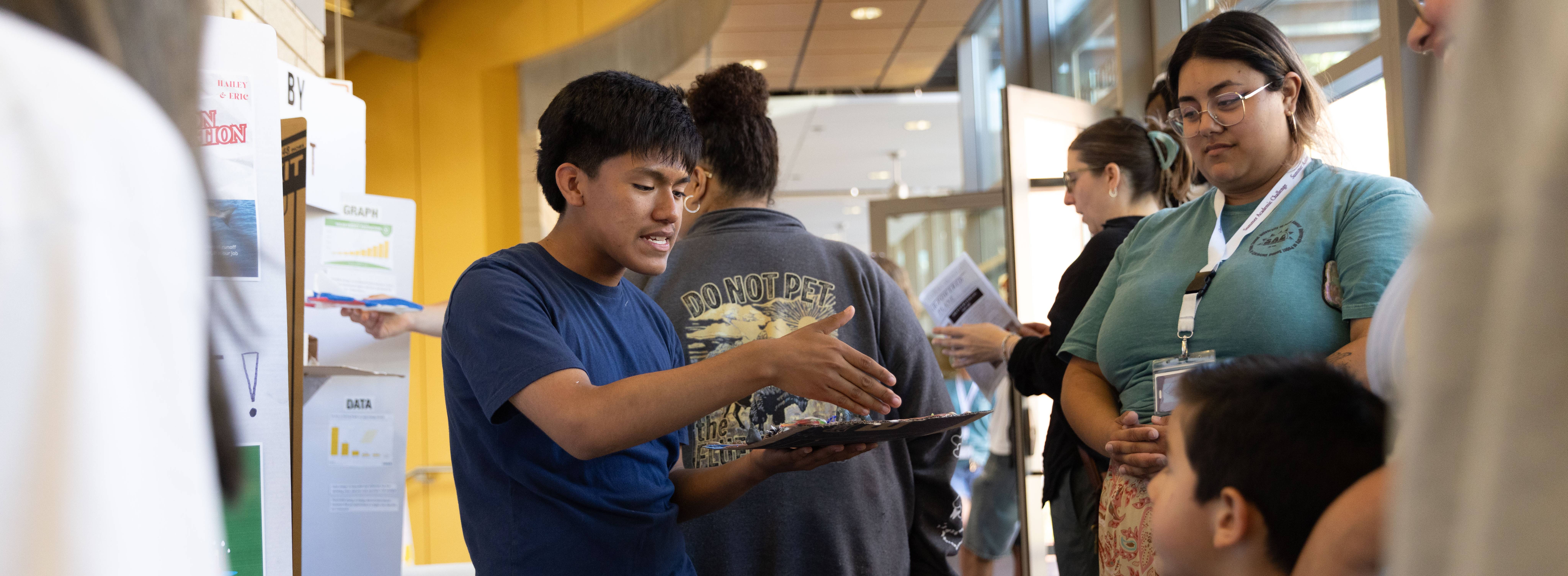 Summer Academic Challenge students present their final research findings.
