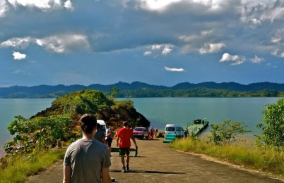 Some people walking to water.