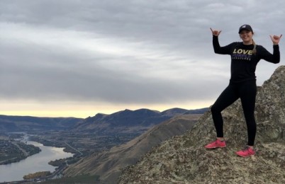 A person standing on a mountain.