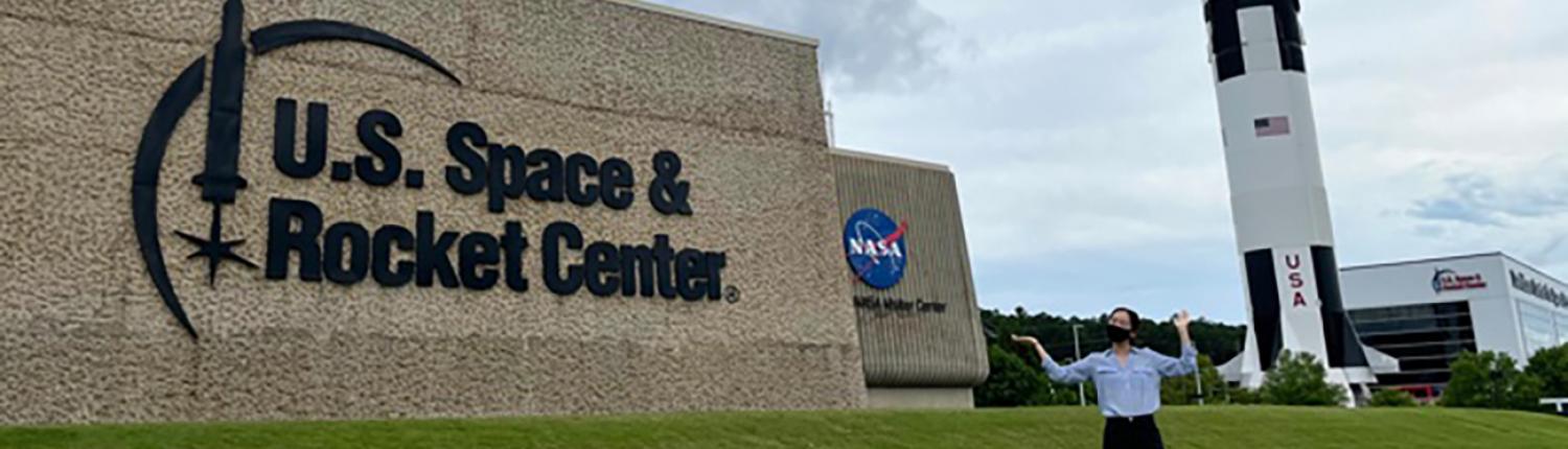 Kyra Lee ’24 in front of NASA's Marshall Space Flight Center