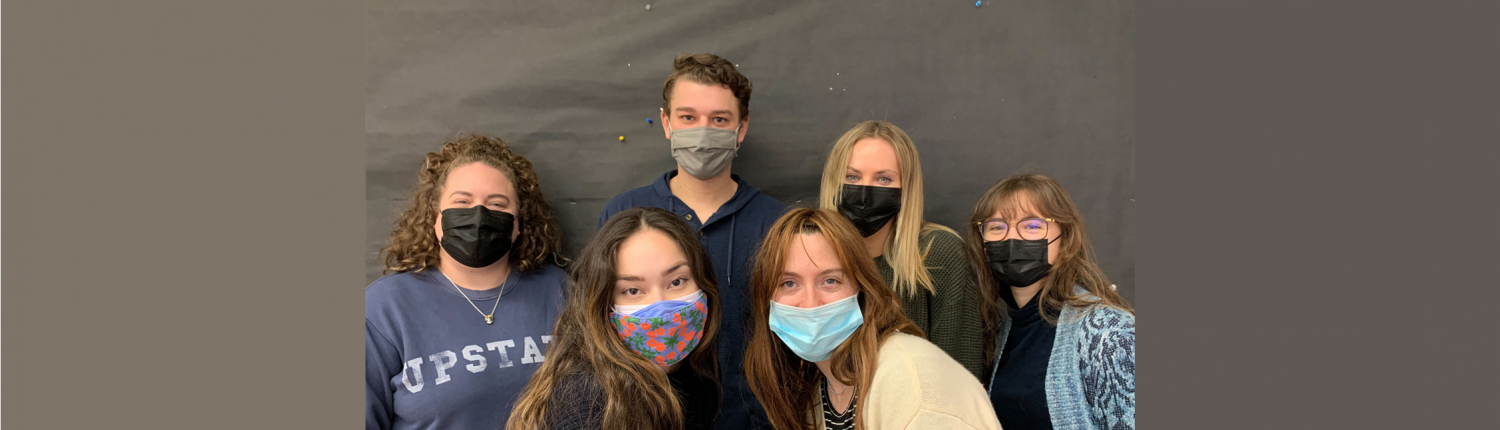 6 students wearing masks smize for the camera