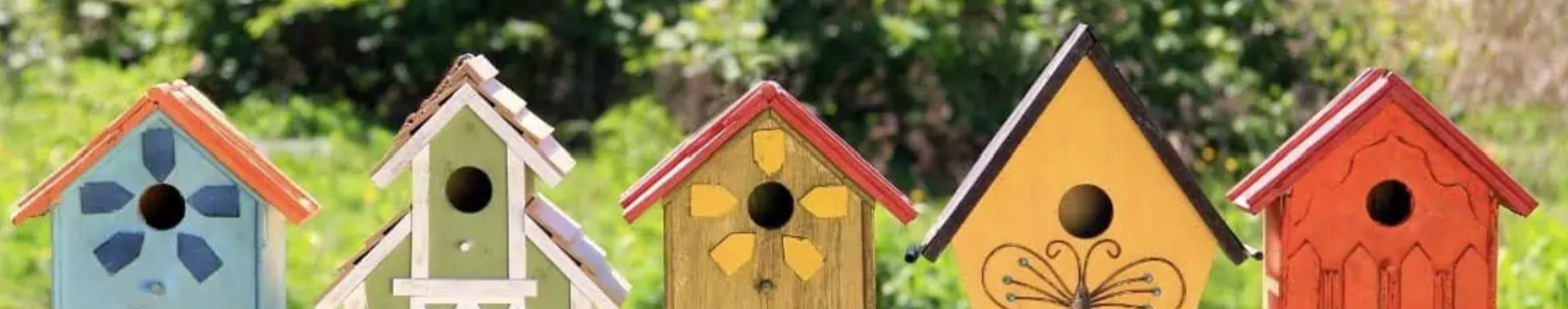 Five colorful birdhouses