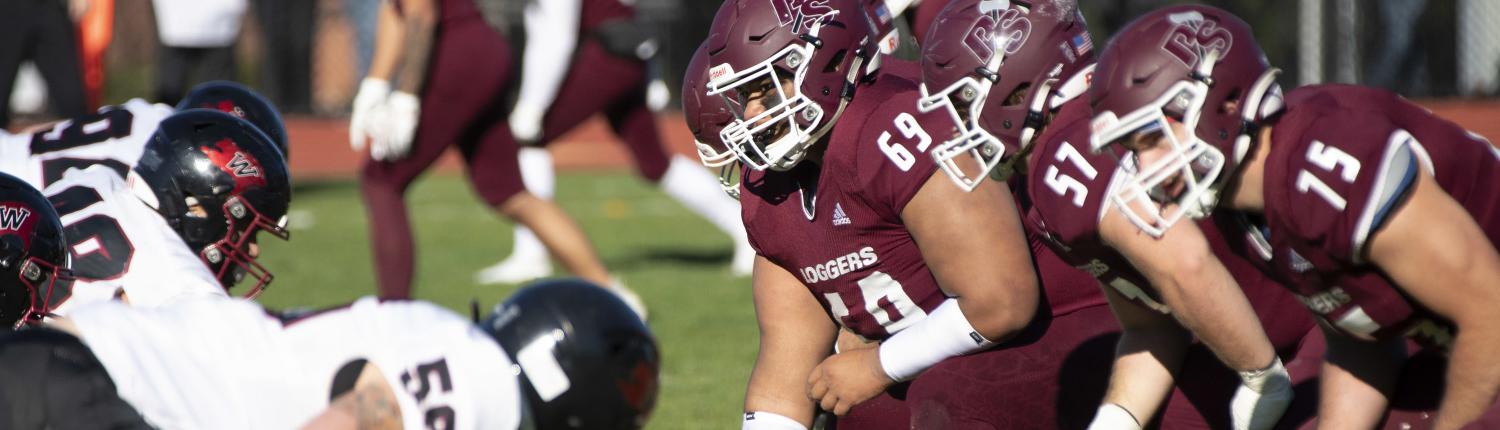 Caleb Puapuaga ’24 prepares for a play with the Logger Football team in 2021.