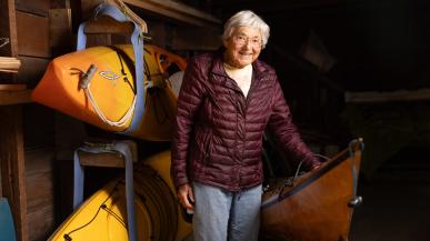 Carol Petrich Kalapus ’51 and her kayaks. Photo by Alex Crook.