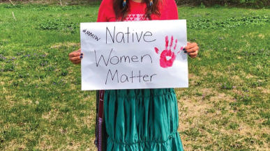 An activist raises awareness of missing and murdered Indigenous women.