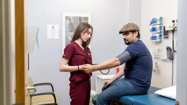 Cecilia Turetzky ’26 takes blood pressure at the Neighborhood Clinic.