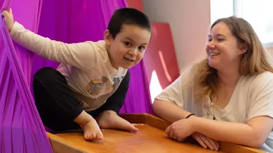 Client and student at the occupational therapy onsite clinic.