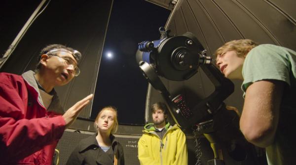 Professor Tanaka and students in the observatory