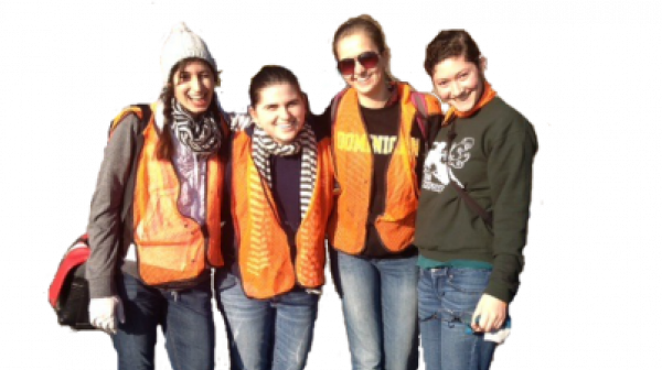 A group of people wearing orange vests