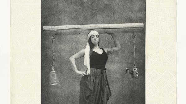 Justice, Sama Alshaibi - photogravure of woman carrying beam on head