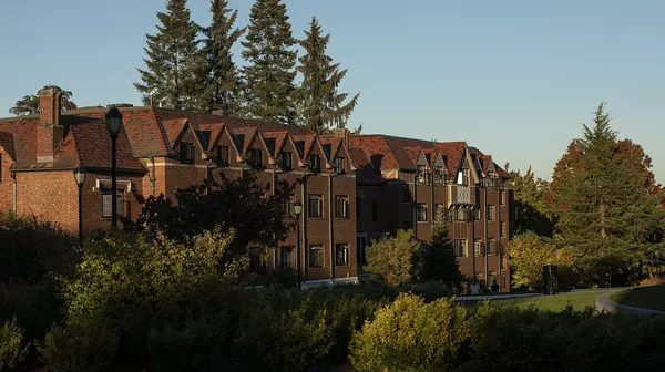 Evening shot of Seward Hall partly in shadow in summer