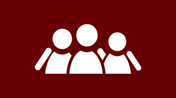 three people standing side by side