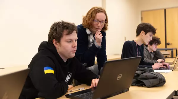 Assistant Professor Marissa Masden teaches students in DATA 160: Survey of Data Analytics with Code