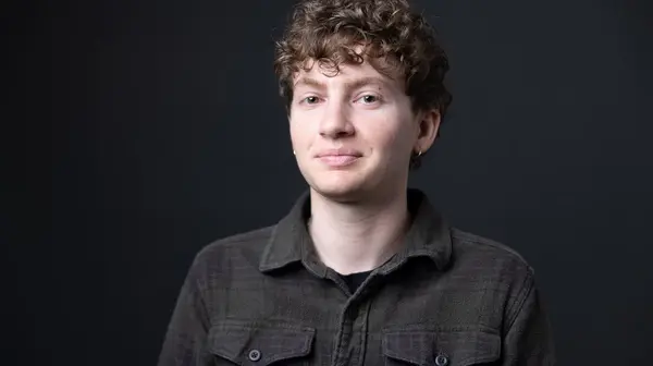 Travis Wolf, Social Media Manager