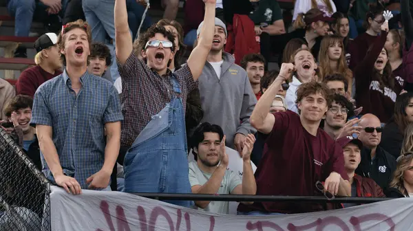 Students cheer at Baker Stadium