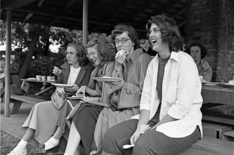 At a festive all-day gathering at Titlow Beach, Mary Louise Moon Long ’50 (below, far left) and Beverly Sinkovich Marcelia ‘51 (far right) grabbed a bite with two unknown Loggers.