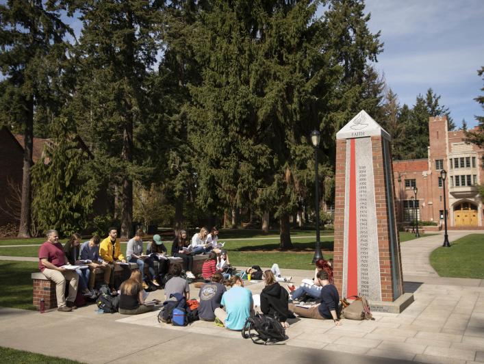 Classes are held outdoors on a sunny spring day.