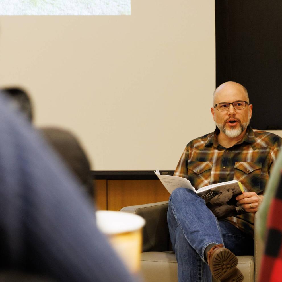 A professor leads a classroom discussion.