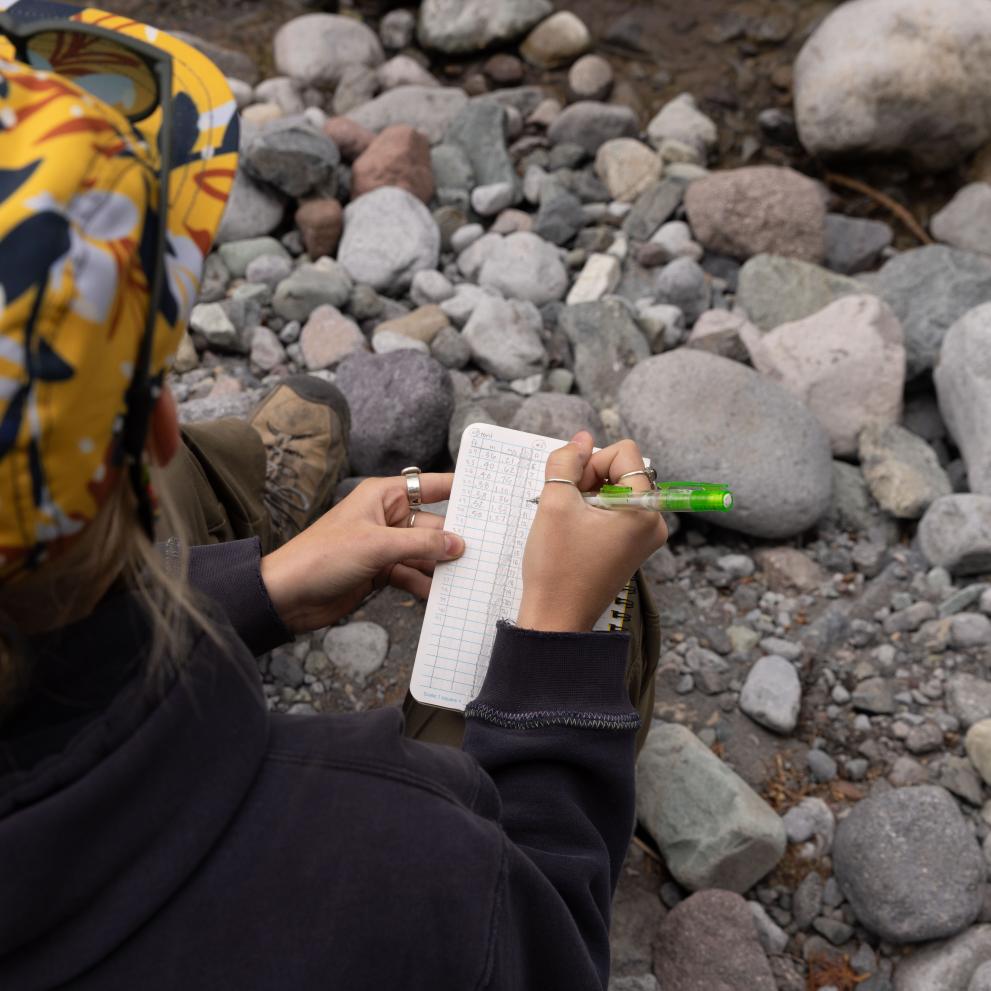 A student does research out in the field.