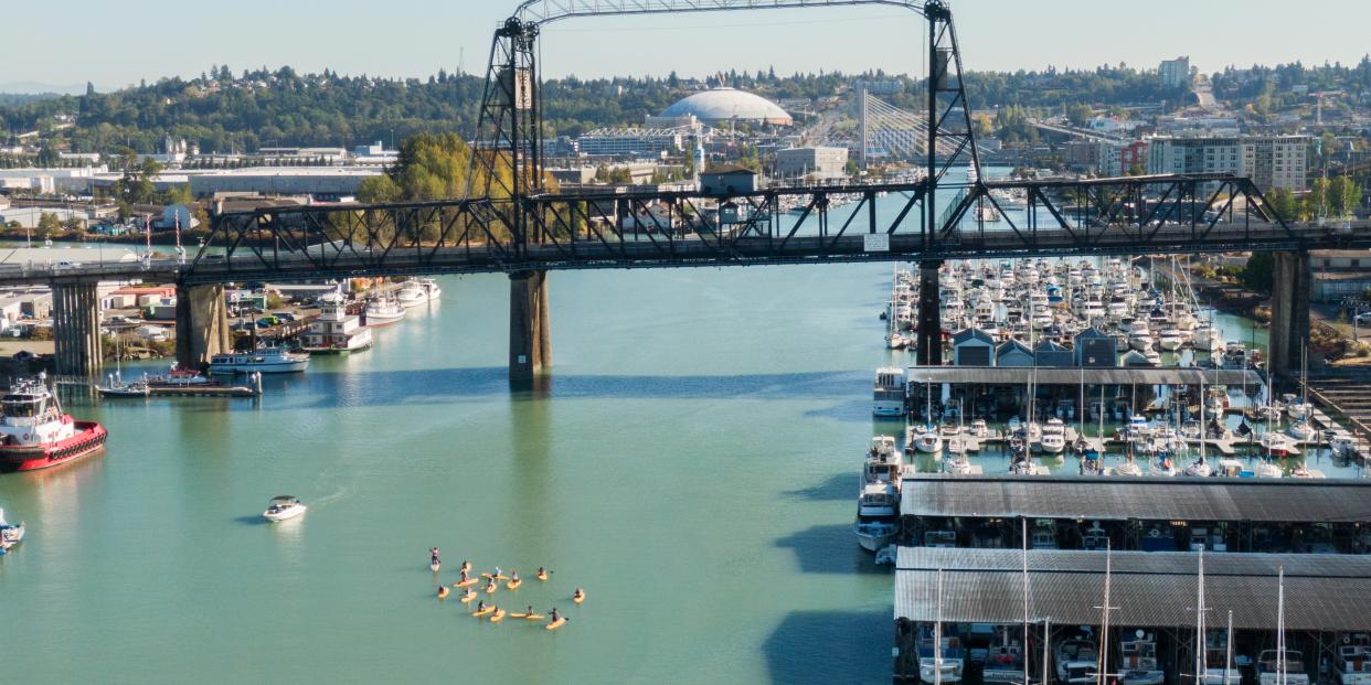 Puget Sound students paddleboarding in Commencement Bay